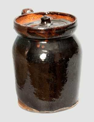Glazed Redware Handled Jar with Lid, probably New England origin, first half 19th century.