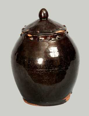 Rare Glazed Redware Jar with Lid and Applied Asterisk Decoration, American, early 19th century.
