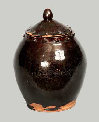 Rare Glazed Redware Jar with Lid and Applied Asterisk Decoration, American, early 19th century.