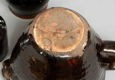 Six Pieces of Redware and Stoneware, New England origin, early 19th century