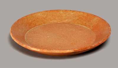Glazed Redware Plate, New England origin, 19th century.