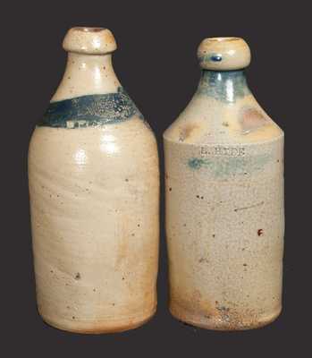 Lot of Two: Stoneware Bottles with Cobalt-Oxide Rings Around Top and Impressed Advertising
