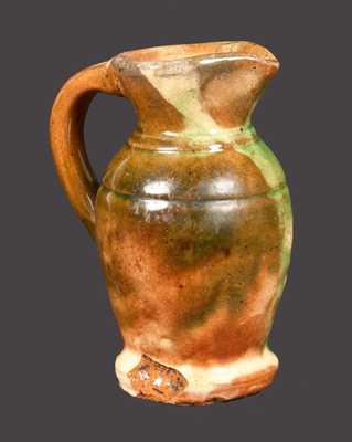 Miniature Multi-Glazed Redware Cream Pitcher, Strasburg, VA origin