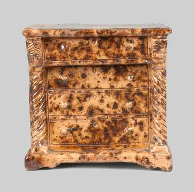 Unusual Redware Dresser-Form Bank with Sponged Manganese Decoration