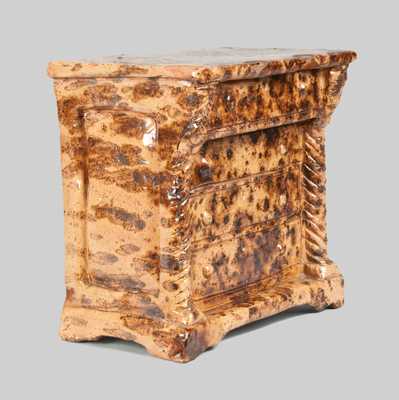 Unusual Redware Dresser-Form Bank with Sponged Manganese Decoration