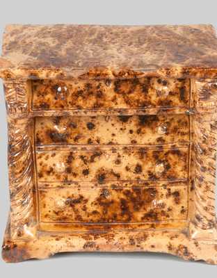 Unusual Redware Dresser-Form Bank with Sponged Manganese Decoration