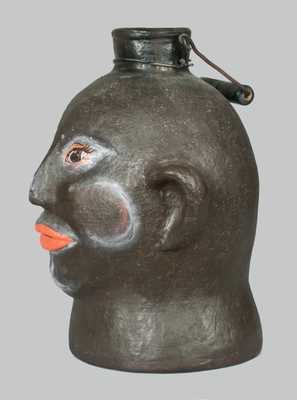 Unusual Cold-Painted Face Jug