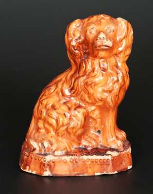 Glazed Redware Spaniel Doorstop, Pennsylvania origin, second half 19th century.