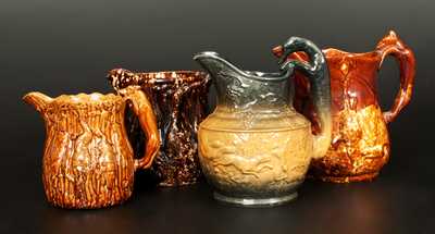 Lot of Four: Rockingham Ware Hound-Handled Pitchers