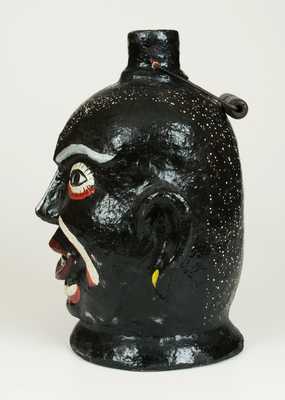 Very Rare Cold Painted Face Jug with Elaborate Speckled Painting