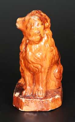 Glazed Redware Spaniel Doorstop, Pennsylvania origin, second half 19th century.