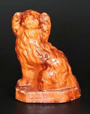 Glazed Redware Spaniel Doorstop, Pennsylvania origin, second half 19th century.