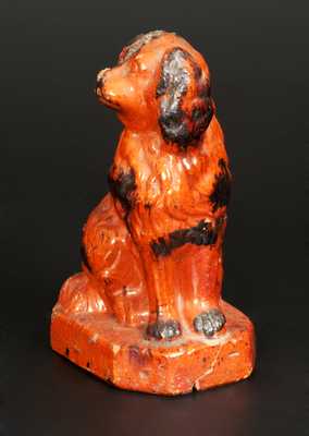 Glazed Redware Figure of a Spaniel, Pennsylvania origin, second half 19th century.