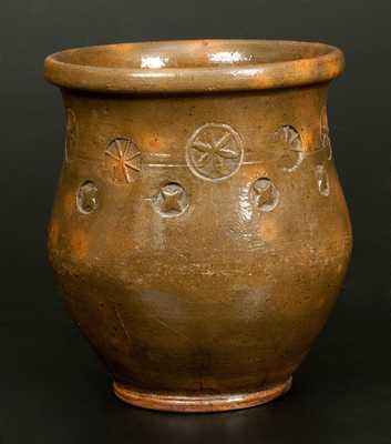 Very Unusual Redware Jar with Stamped Raised Star and Pinwheel Designs