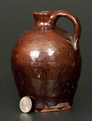 Small Manganese Redware Jug, New England Origin