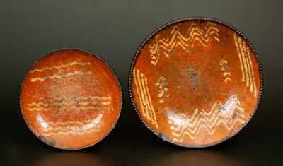 Lot of Two: Redware Plates with Yellow Slip Decoration