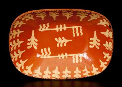 Outstanding American Redware Loaf Dish with Profuse Slip Decoration