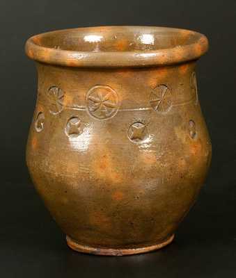 Very Unusual Redware Jar with Stamped Raised Star and Pinwheel Designs