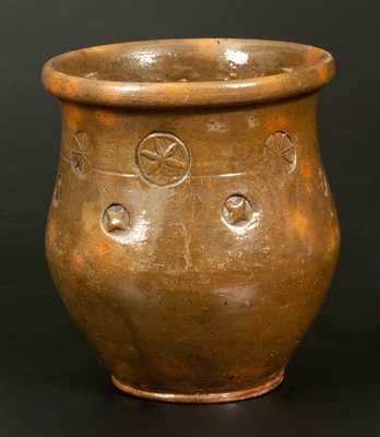 Very Unusual Redware Jar with Stamped Raised Star and Pinwheel Designs