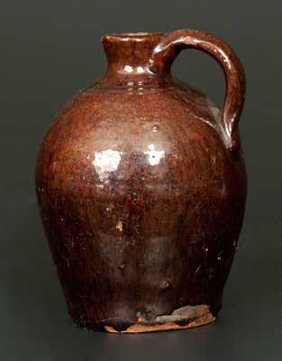 Small Manganese Redware Jug, New England Origin
