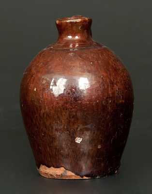 Small Manganese Redware Jug, New England Origin