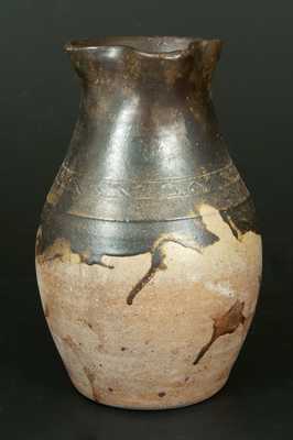 Unusual Stoneware Pitcher with Albany Slip Dip and Incised Sine Wave Design, Tennessee Origin