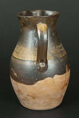 Unusual Stoneware Pitcher with Albany Slip Dip and Incised Sine Wave Design, Tennessee Origin