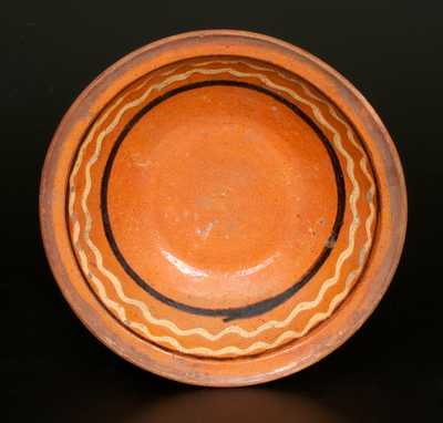 Redware Bowl with Yellow and Brown Slip-Decorated Interior