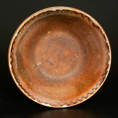 Unusual Redware Bowl with Lead-Glazed Exterior and Manganese Slip-Decoration at Rim