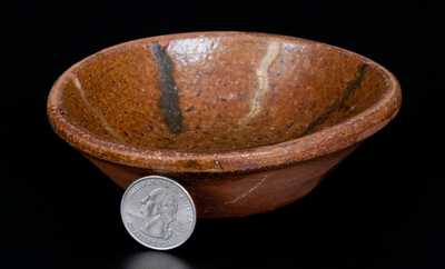 Scarce Diminutive Redware Bowl with Yellow and Brown Striped Decoration