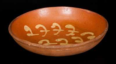 Pennsylvania Redware Plate with Profuse Yellow Slip Decoration