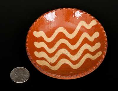 Miniature Pennsylvania Redware Plate with Yellow Slip Decoration