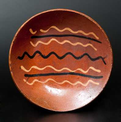 Pennsylvania Redware Plate with Brown and Yellow Slip Decoration