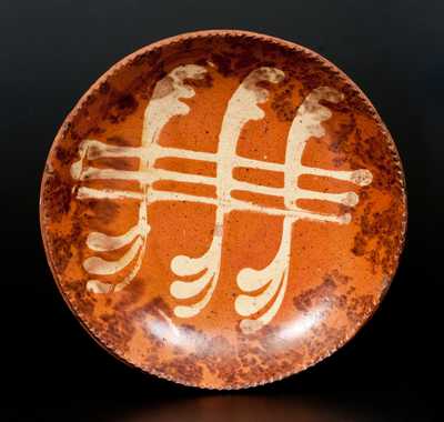 Pennsylvania Redware Plate with Yellow Slip and Brown Sponged Decoration