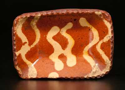 Miniature Slip-Decorated Pennsylvania Redware Loaf Dish