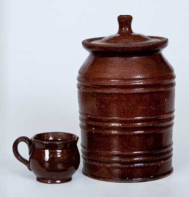 Two Pieces of Glazed Redware, Pennsylvania or New England origin, 19th century.