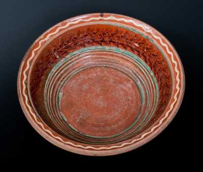 Redware Bowl with Three-Color Slip-Decorated Interior