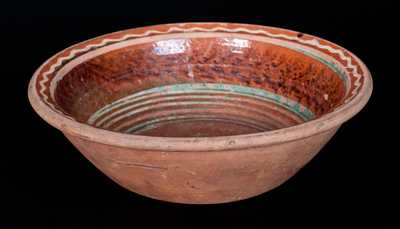 Redware Bowl with Three-Color Slip-Decorated Interior