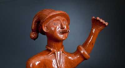 Very Rare Extremely Large Detailed Redware Figure of a Man
