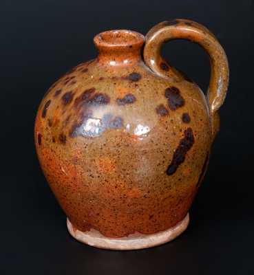 Diminutive Redware Jug with Manganese Splotches