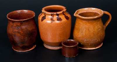 Lot of Four: 2 Redware Jars with Manganese Decoration, Lead-Glazed Redware Batter Pitcher, Small Redware Vessel or Inkwell