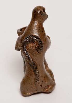 Stoneware Figure of a Monkey Holding a Flowerpot, probably Southern, possibly Decker (Tennessee)