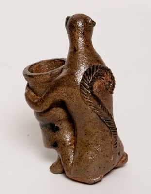 Stoneware Figure of a Monkey Holding a Flowerpot, probably Southern, possibly Decker (Tennessee)