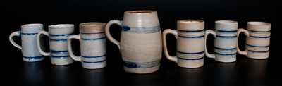 Lot of Seven: Stoneware Mugs with Cobalt Bands incl. Large-Sized Example