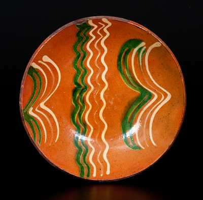 Exceptional Slip-Decorated Berks County, PA Redware Plate