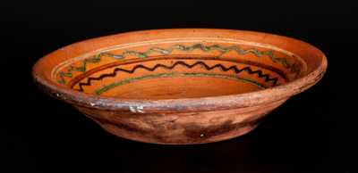 Redware Bowl with Green, Yellow, and Brown Slip Decoration