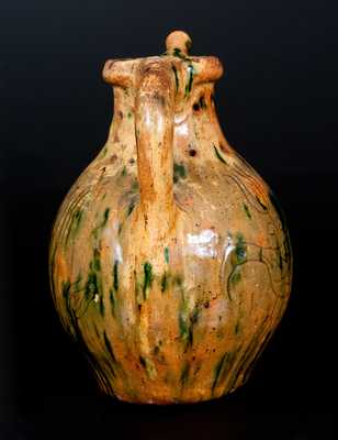 1838 Copper and Lead-Glazed Redware Puzzle Jug
