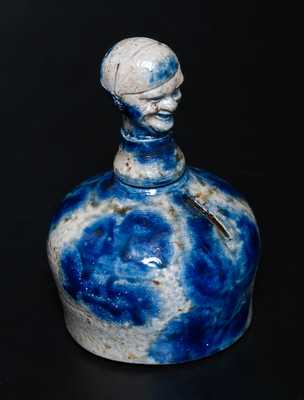 Rare Stoneware Bank with Man s-Head Finial and Cobalt Floral Decoration