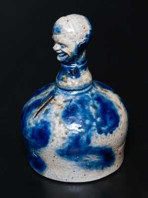 Rare Stoneware Bank with Man s-Head Finial and Cobalt Floral Decoration