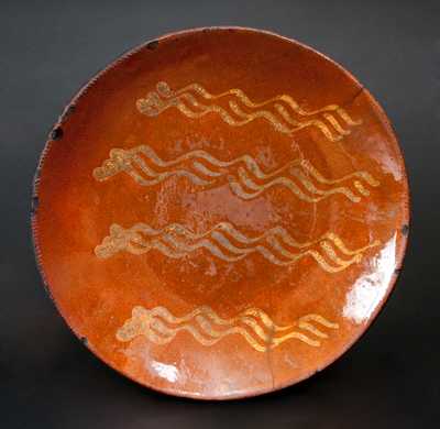 Slip-Decorated Redware Charger, Northeastern U.S. origin, c1840